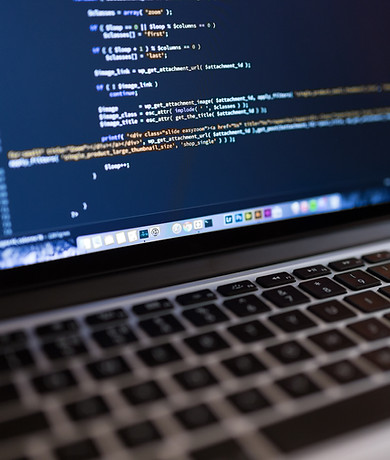 Code on Laptop Computer