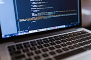 Code on Laptop Computer