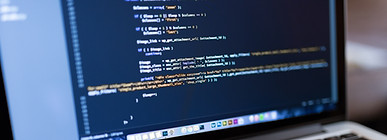 Code on Laptop Computer