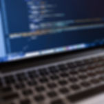 Code on Laptop Computer