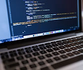 Code on Laptop Computer