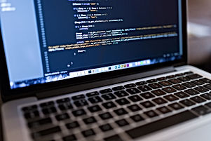 Code on Laptop Computer