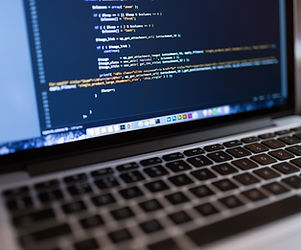 Code on Laptop Computer