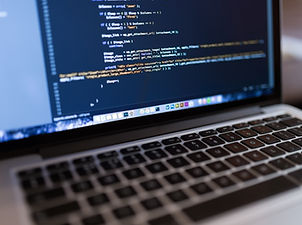 Code on Laptop Computer