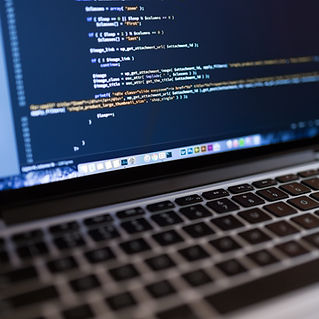 Code on Laptop Computer