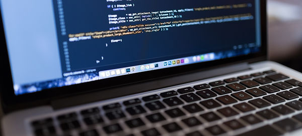 Code on Laptop Computer