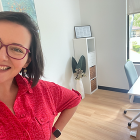 Susie Allen smiling in clinic