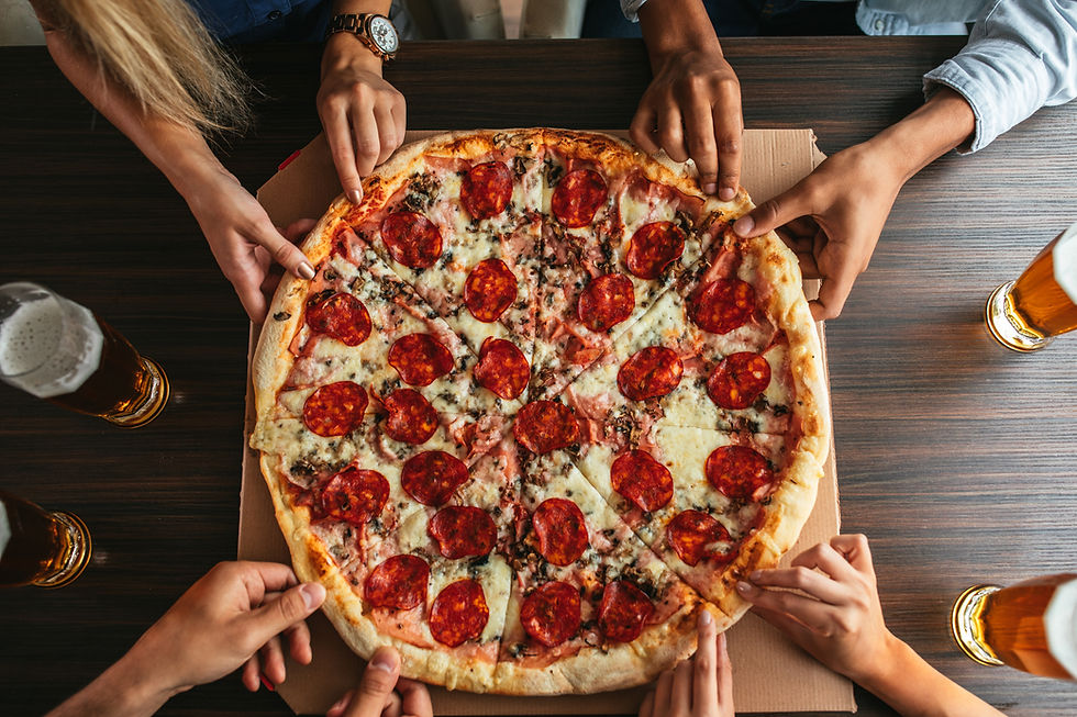 High angle view of a pepperoni pizza fresh out of the oven