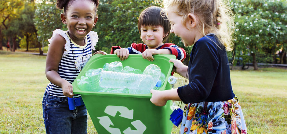 Girls Carrying a Recycling Bin_edited.jpg