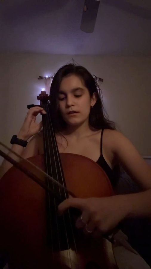 Angelina of Quill & Chord on the Cello