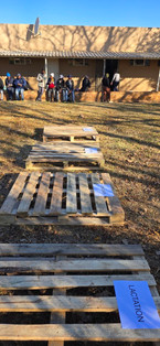 Empty pallets on the ground with labels