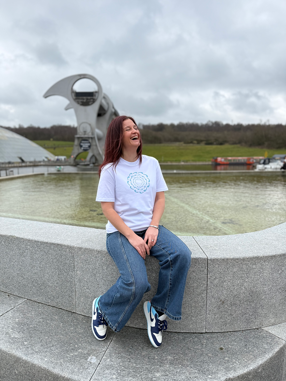 Thumbnail: Woman wearing a white T with one of our underwater female swimmer designs