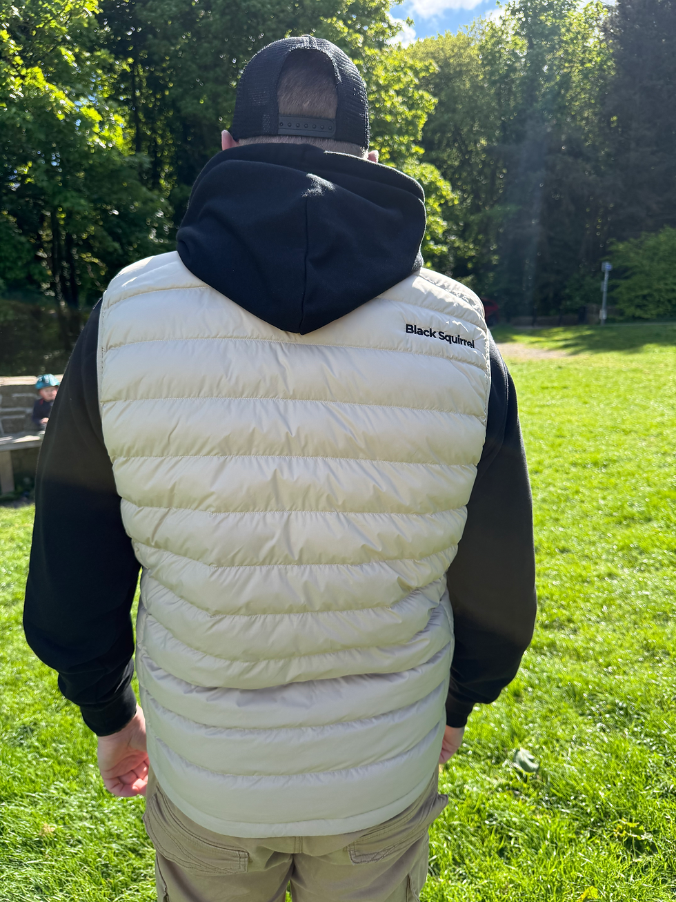Thumbnail: Man wearing a Cream Black Squirrel Clothing Gilet from behind
