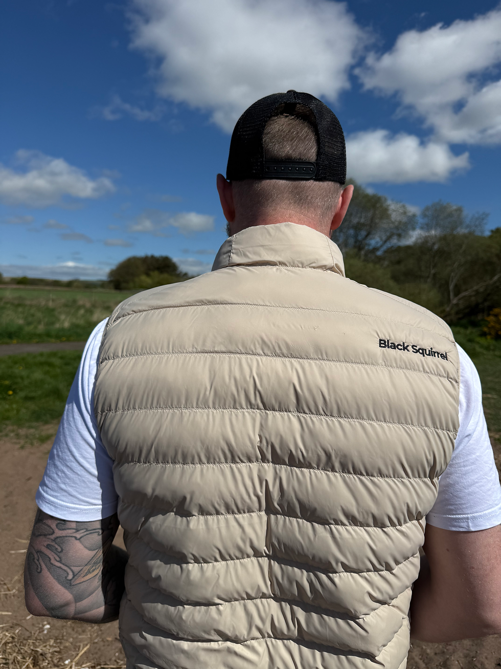 Man wearing a Cream Black Squirrel Clothing Gilet from behind