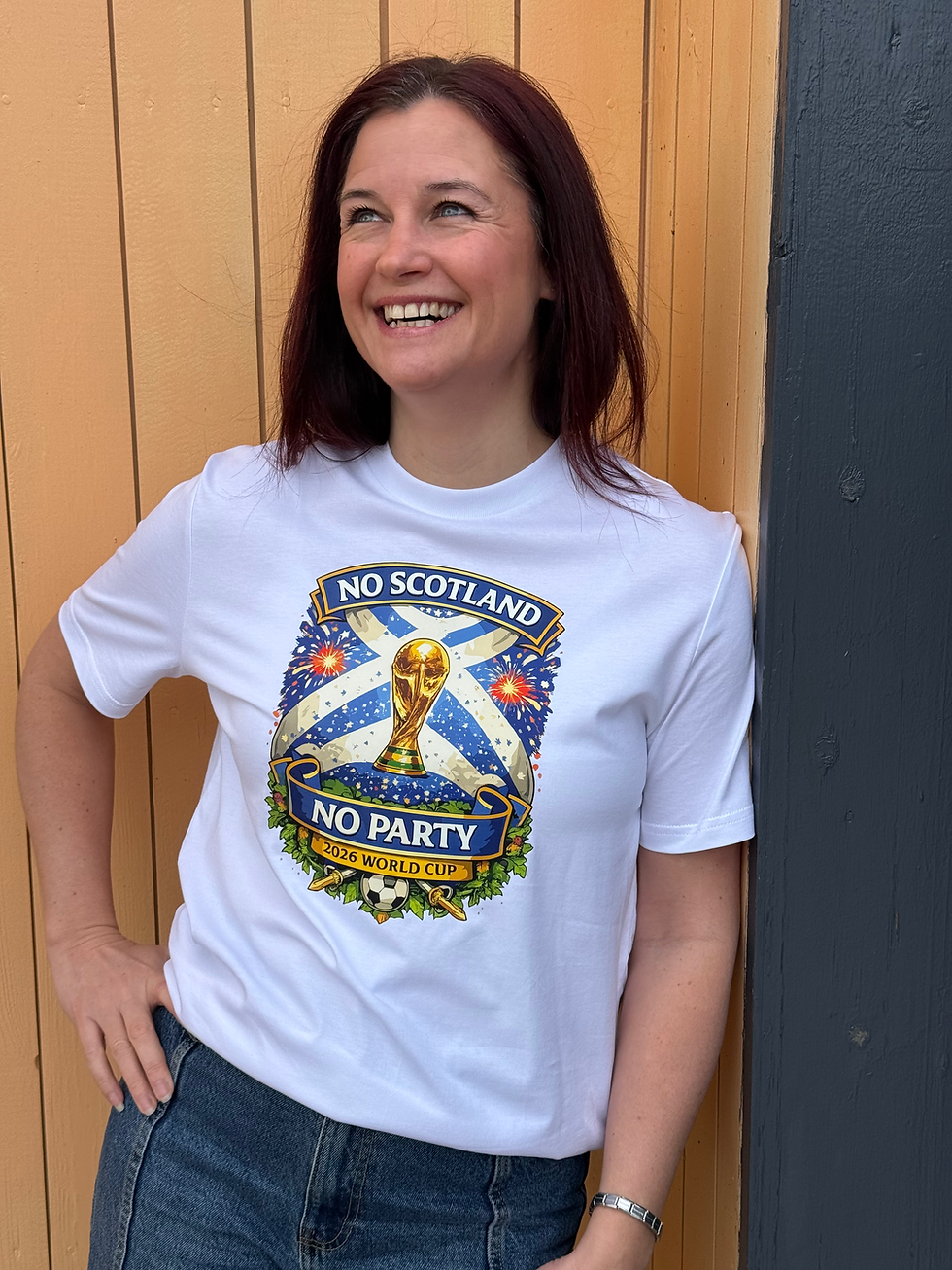 Woman wearing a white t shirt with No Scotland No Party design on the front