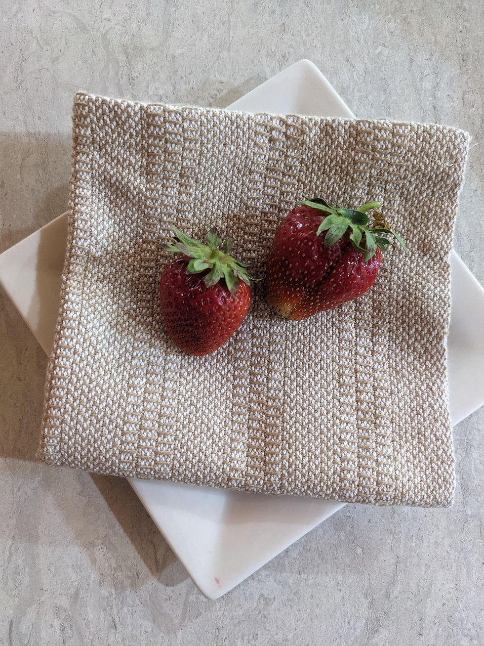 Flax handwoven cotton everyday napkin arranged on a cocktail plate