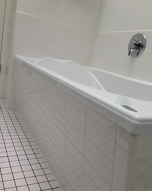 Custom tiled bathtub installation in residential bathroom renovation project in Kamloops BC