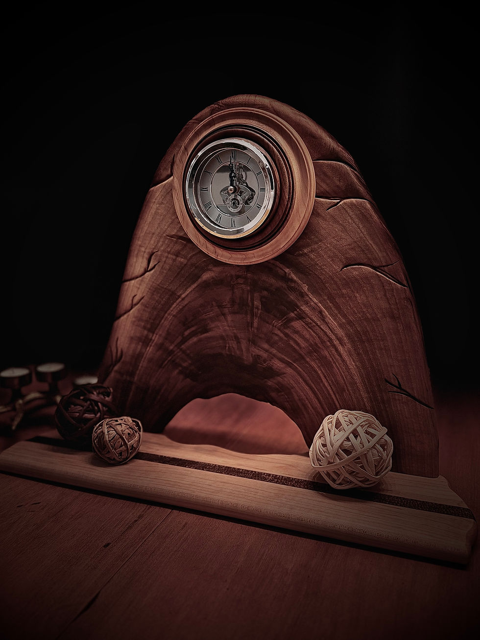 Hand-carved walnut and maple mantle clock with silver tone bezel insert, asymmetrical texturing on live-edge slab