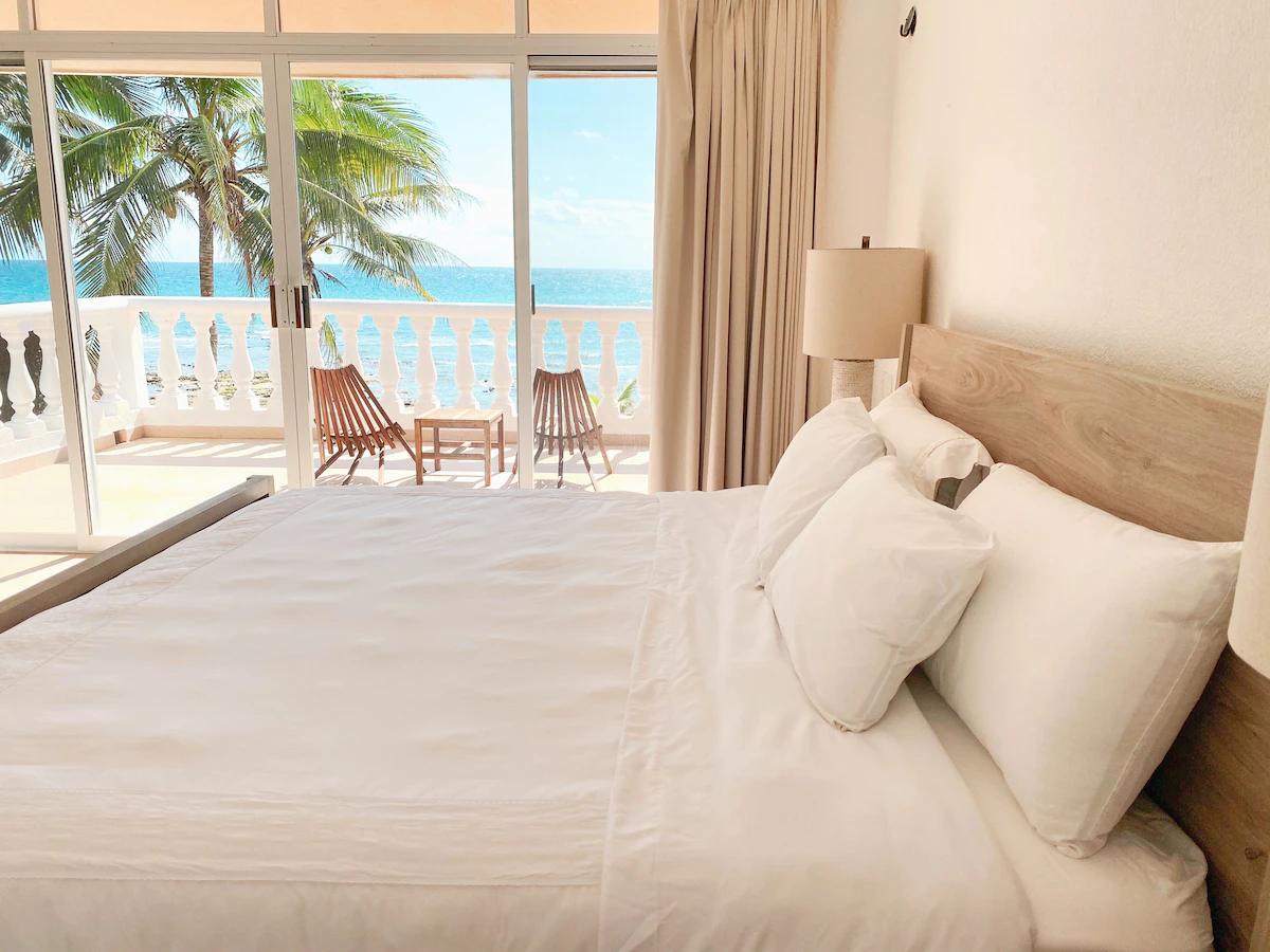 Bedroom interior at Casa Paamul as seen in the Staycation Tulum episode.