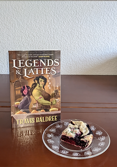 Legends and Lattes Book with a slice of Mixed Berry Pie