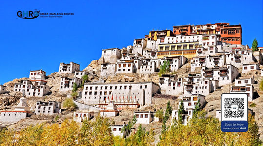 White buildings on a hill, text and QR code, Great Himalayan Routes, best tour agency in india