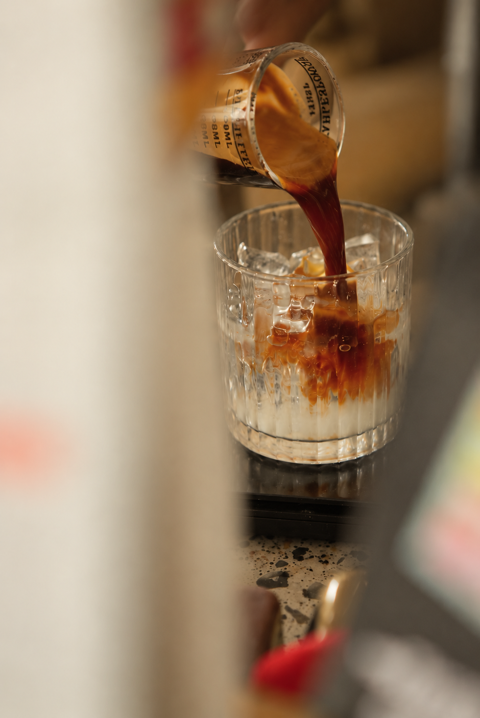Cinematic Iced Coffee Pour.png