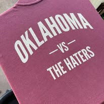 Red t-shirt that says "Oklahoma vs. The Haters"