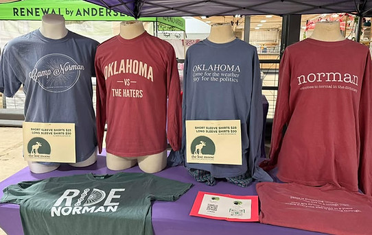 image of multiple t-shirts on a table