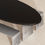 Miniature : black wooden oval dining table with stainless steel legs 