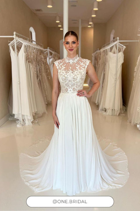 high neckline sheath wedding gown with cap sleeves and lace