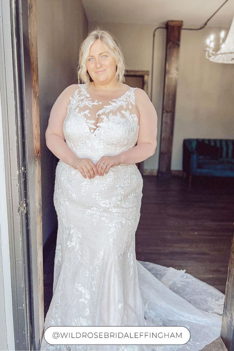 Blonde Curvy Bride in fit-n-flare gown with skin illusion high neckline and lace