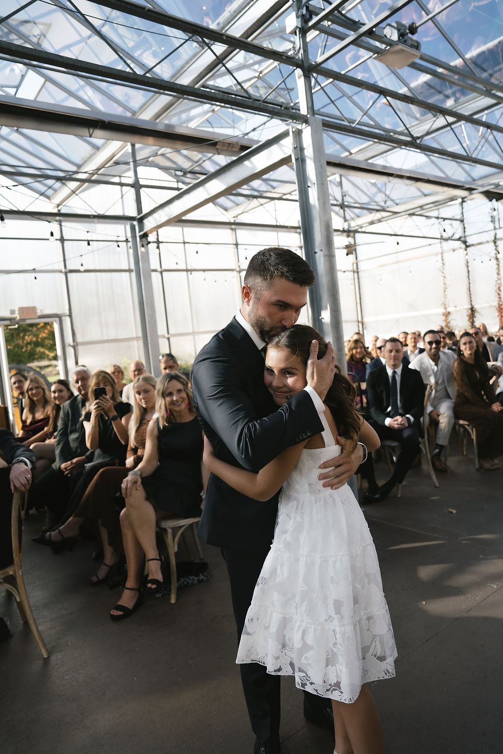 groom hugging daughter