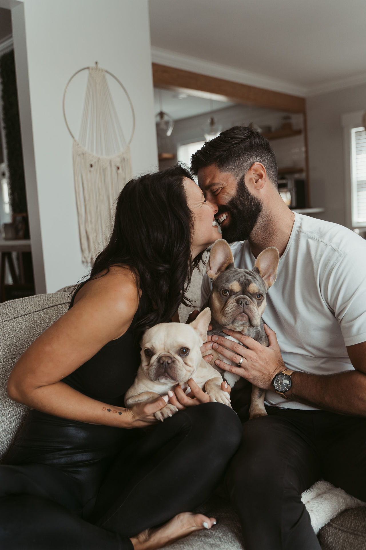 couple with their dogs
