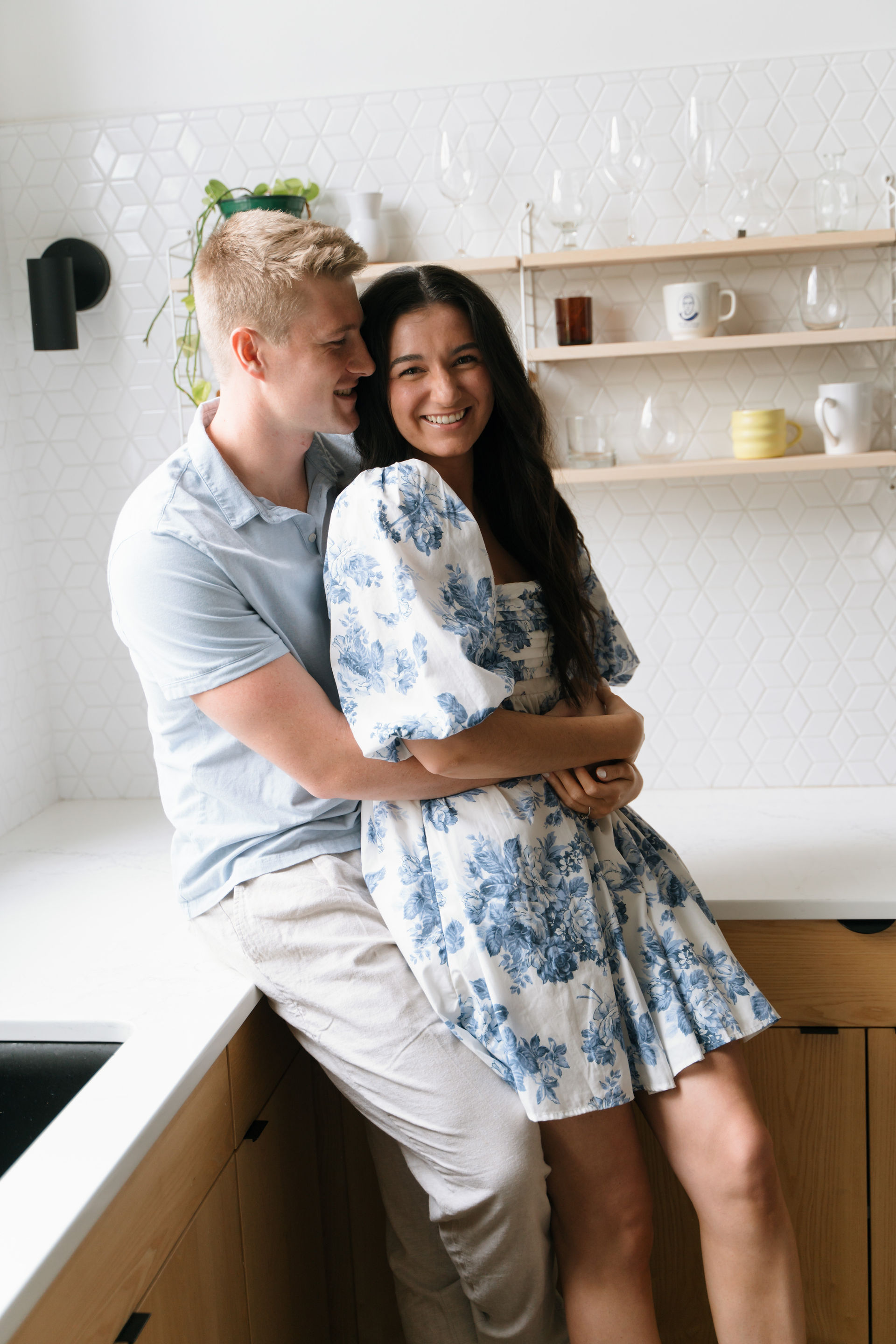 engaged couple in kitchen