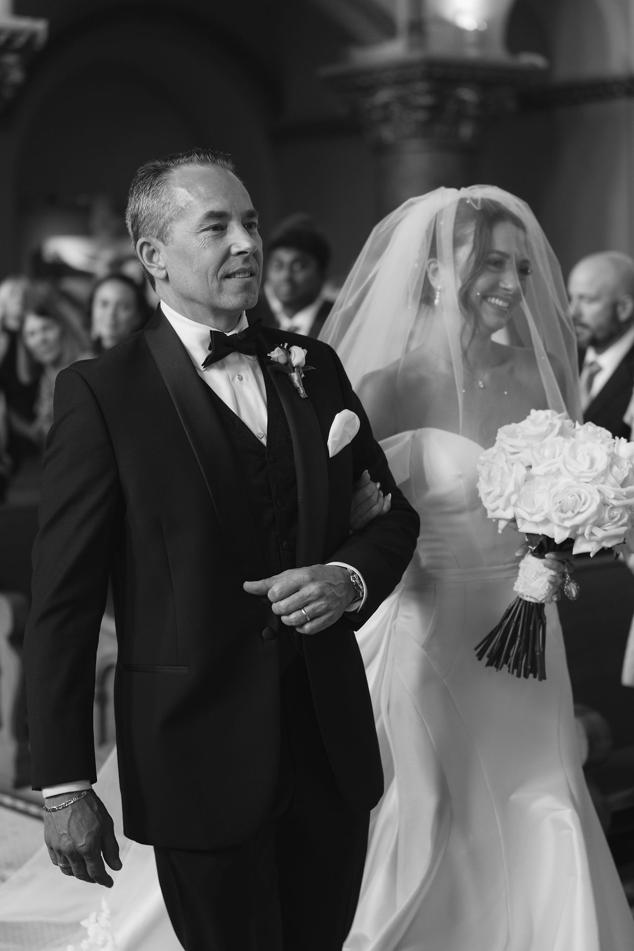 bride and father walking down aisle