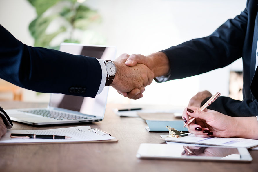 business-people-shaking-hands-together (1).jpg