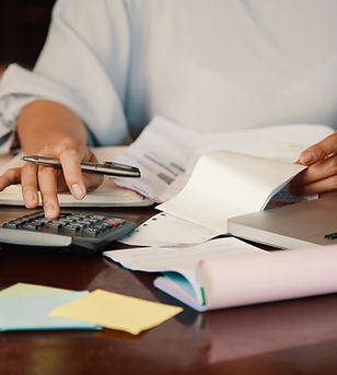 entrepreneur-working-with-bills (1).jpg