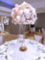 White blush tall gold stand centrepiece