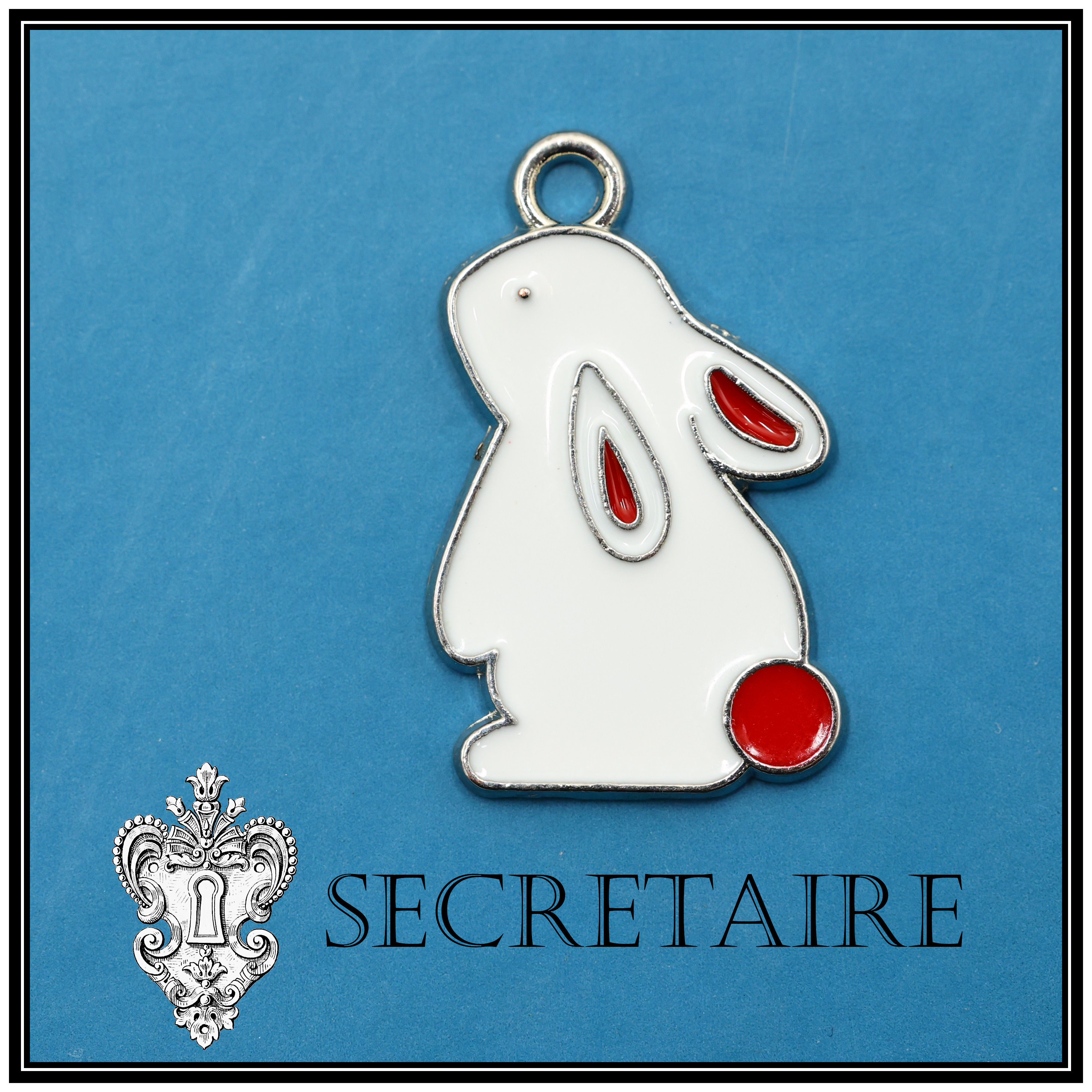 Charm: White rabbit with red tail. Size: 2.2 cm [E12]