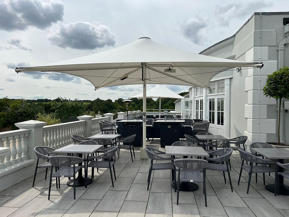 Thumbnail: Padstow Rope Stacking Armchair Greywith tables under umbrella