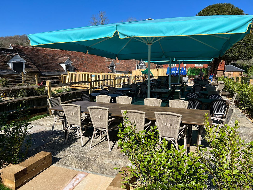 Thumbnail: Scaffold Dining Height Table Base with tops and chaors, under giant umbrella