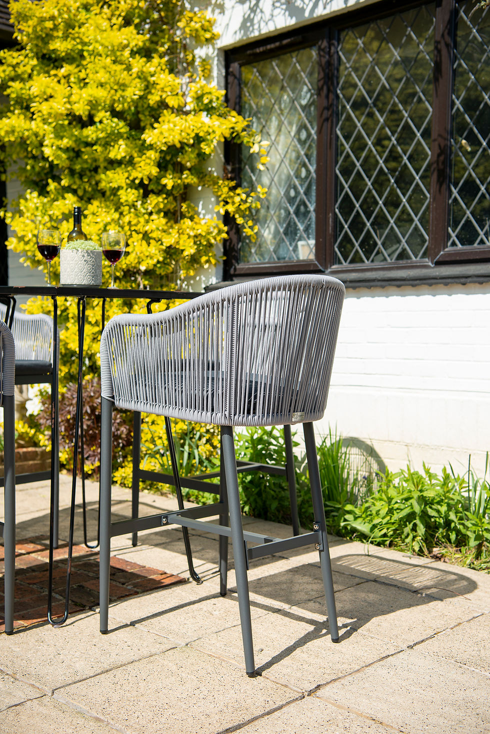 Thumbnail: Padstow Rope Mid Height Chair Grey rear view on patio