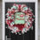 Thumbnail: Handmade Christmas wreath with candyland sign and marshmallows, shown hanging on a black door for a stylish festive entryway.