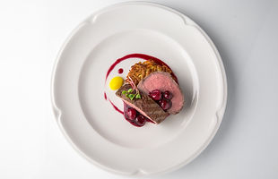 Filet mignon Beef, or Pork. Grilled young calf tenderloin with berries, mashed potatoes. B