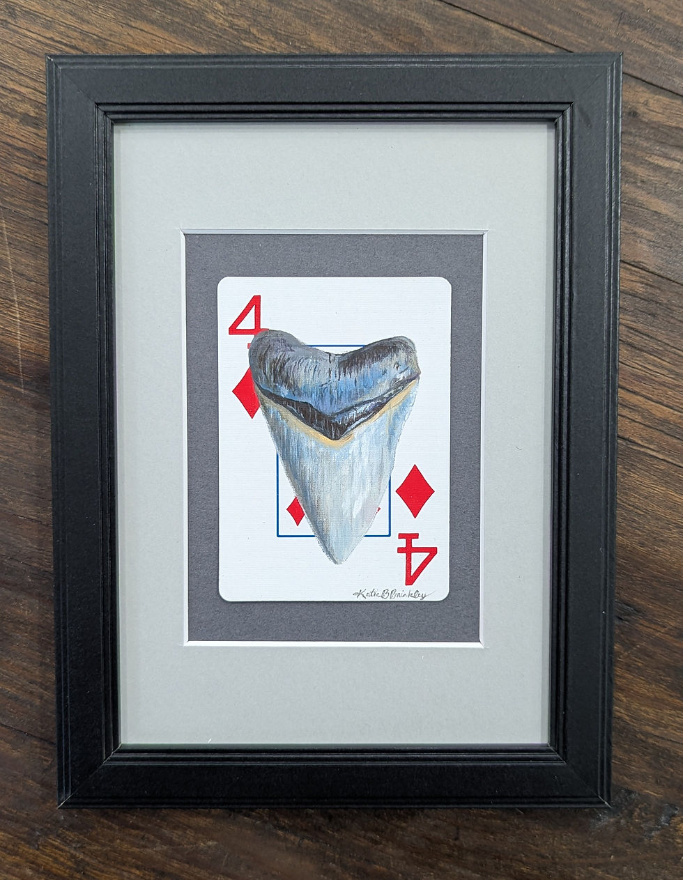 megalodon tooth painting on a four of diamonds playing card