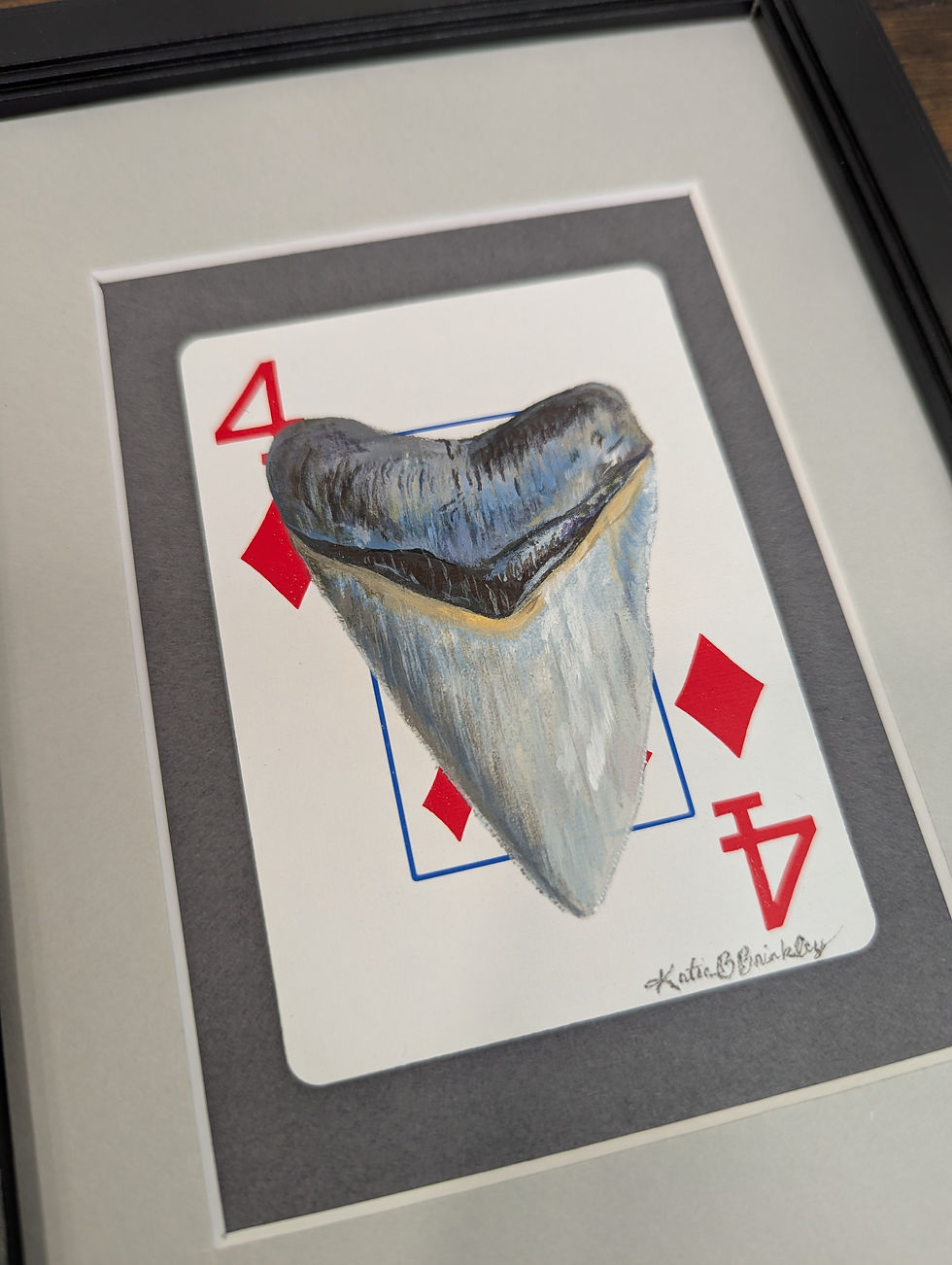 megalodon tooth painting on a four of diamonds playing card