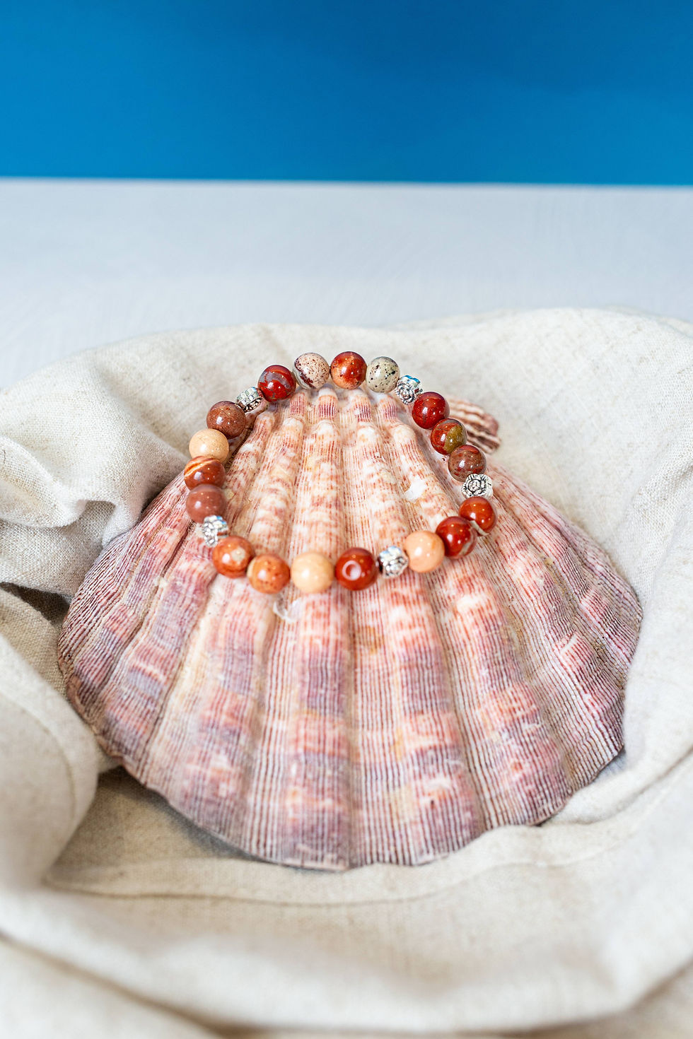 Thumbnail: Jasper Bracelet - loop of varied red gems with silver workings