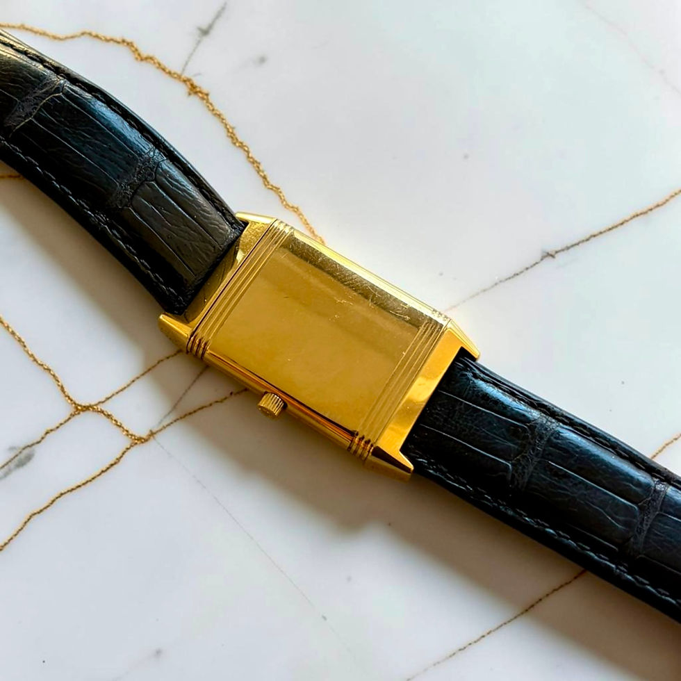 Thumbnail: Back of Monoface gold Jaeger-LeCoultre Reverso with black strap.
