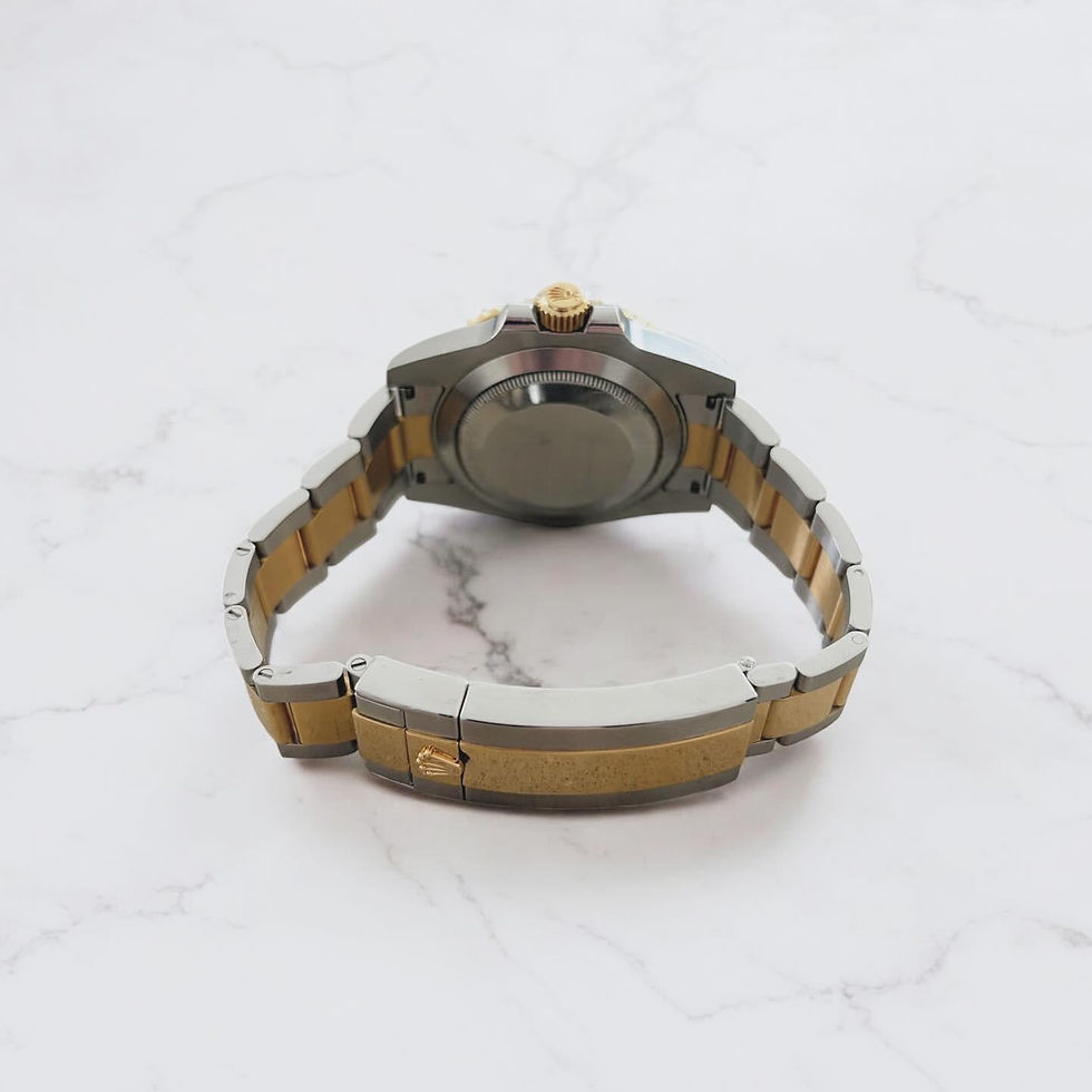 Thumbnail: Rolex Submariner Bluesy Reference 116613LB Showcasing Bracelet And Caseback