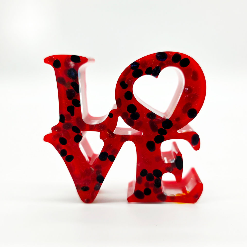 Small"LOVE" freestanding art, red with multicolored stones